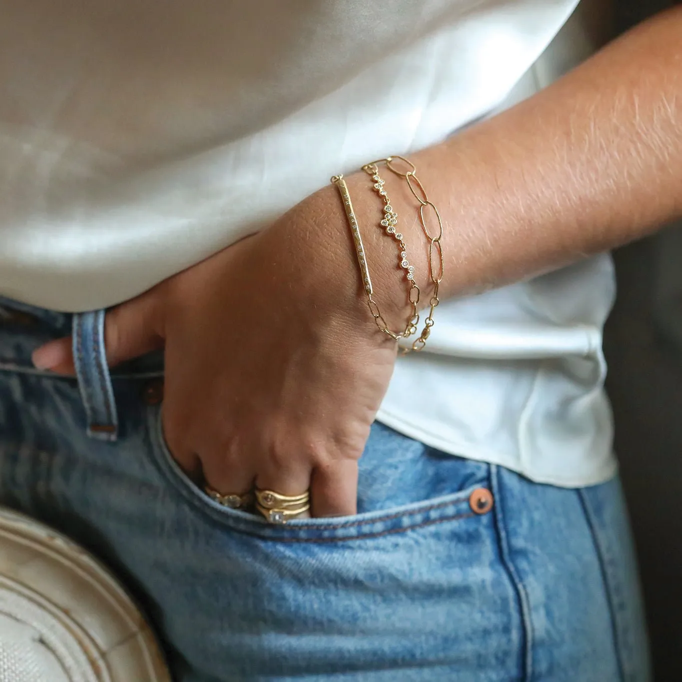 18 Karat Yellow Gold Bubble Chain Bracelet with Three Bezel Set Diamond Clusters