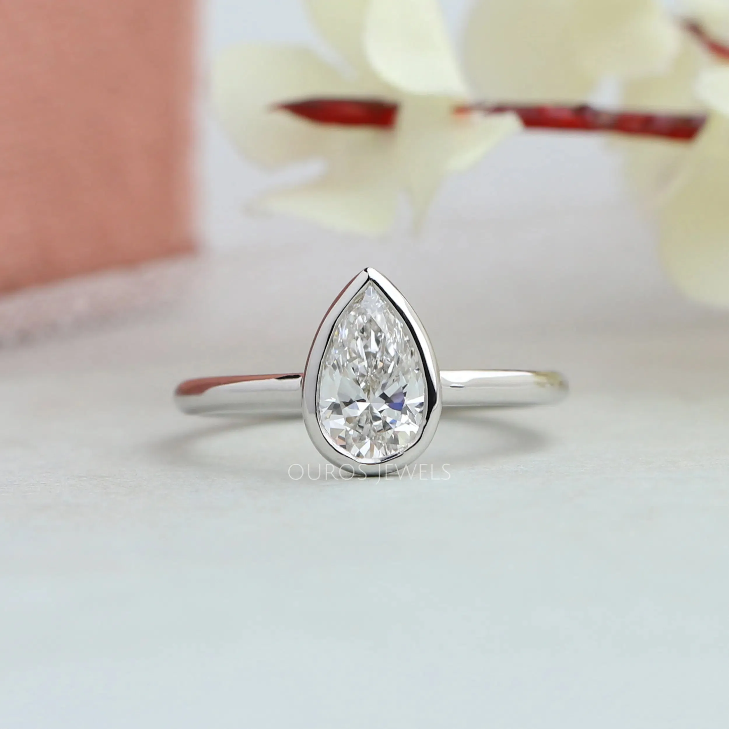 Bezel Set Pear Cut Lab Solitaire  Ring