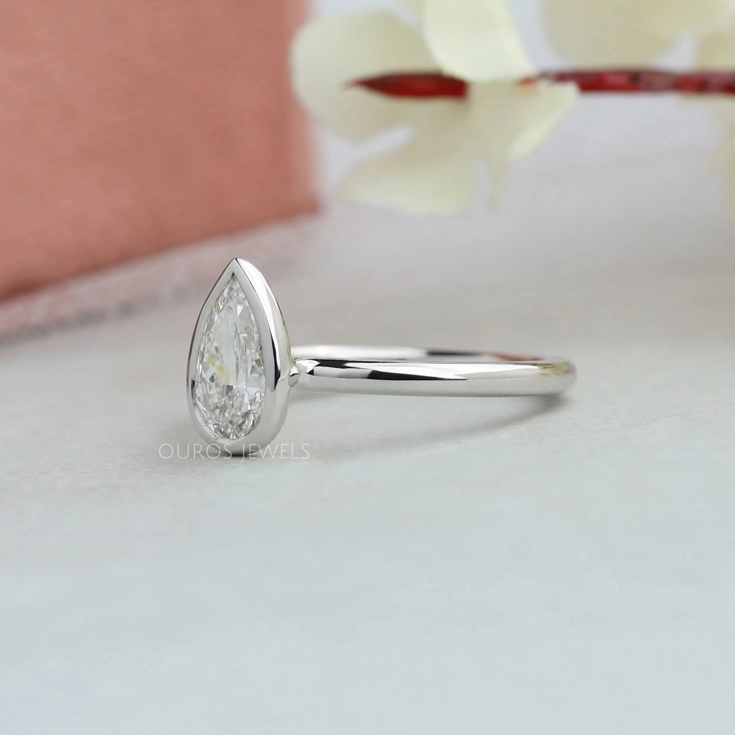 Bezel Set Pear Cut Lab Solitaire  Ring