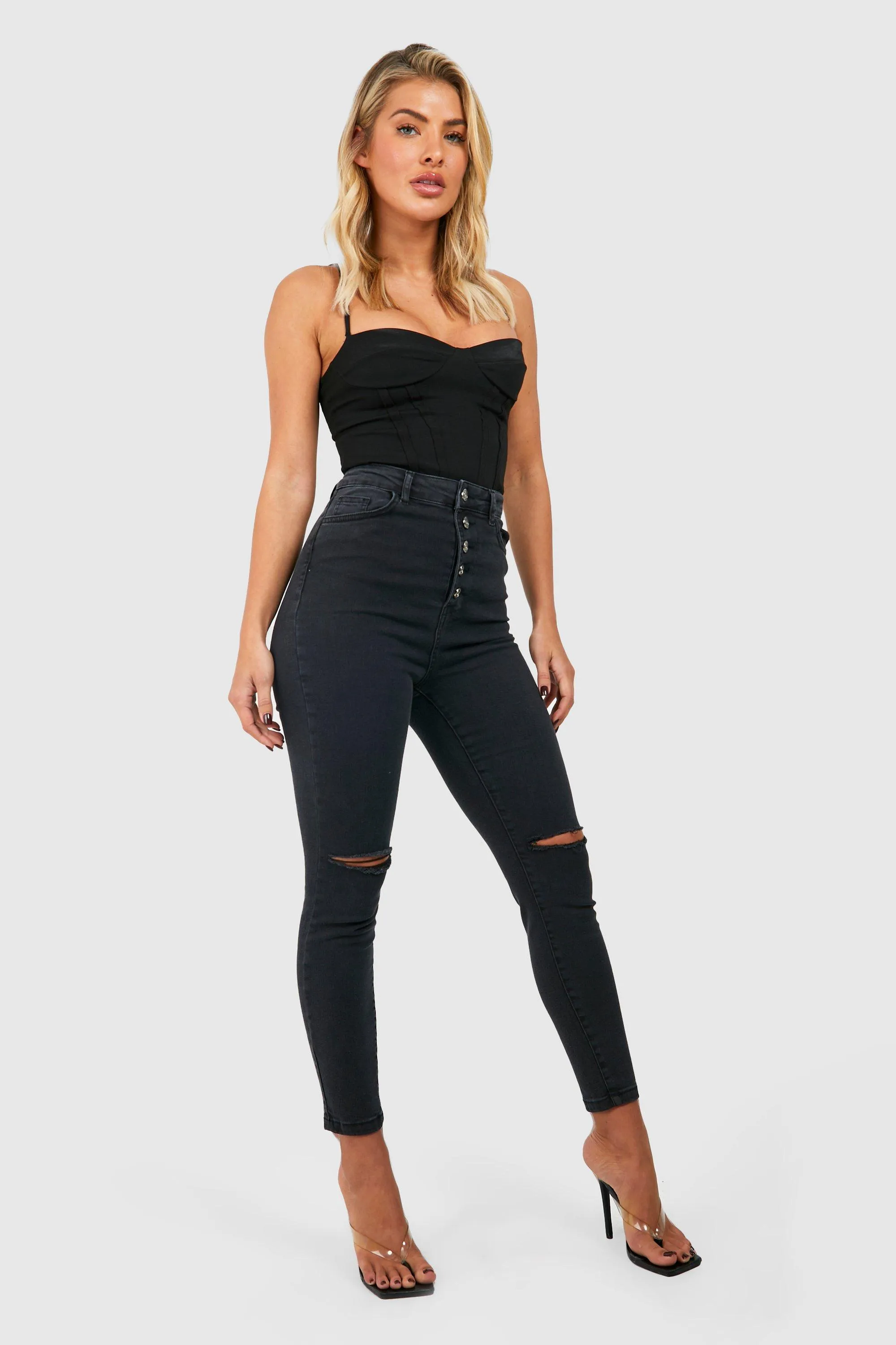 High Waisted Button Front Ripped Skinny Jeans