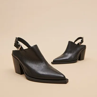 Mules with beveled heels in black leather