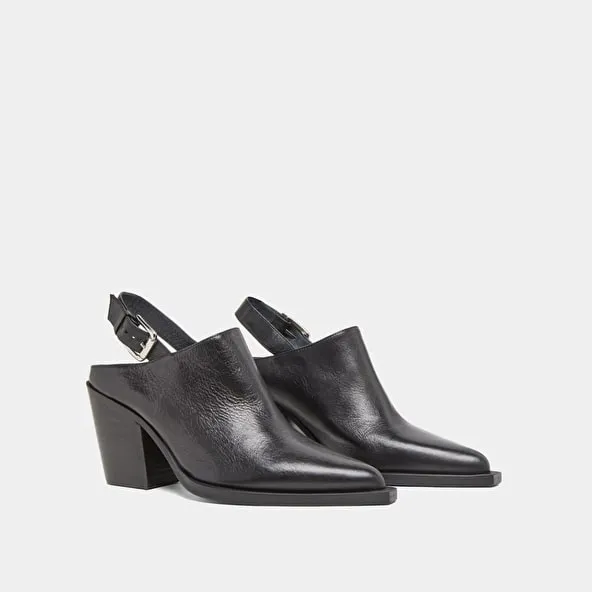 Mules with beveled heels in black leather