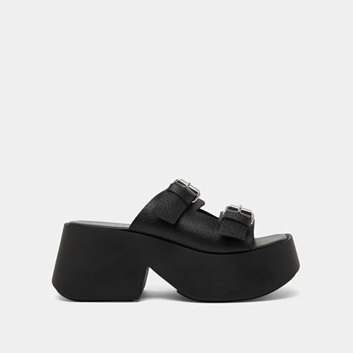 Mules with thick straps, buckles and open toes in black grained leather