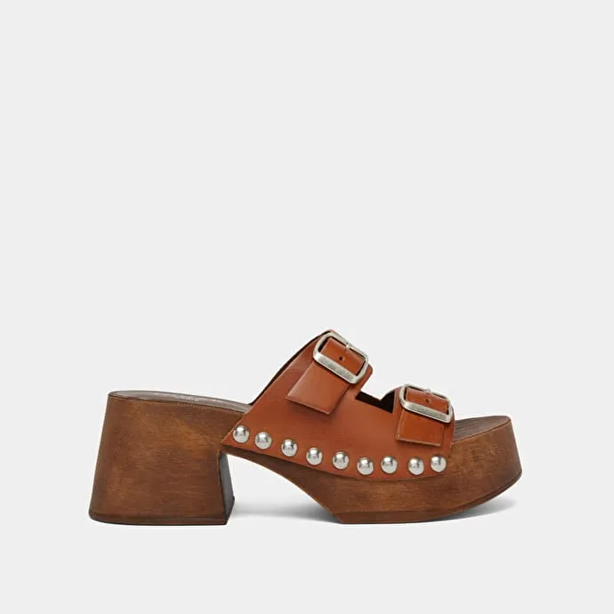 Platform mules with open toes in cognac leather