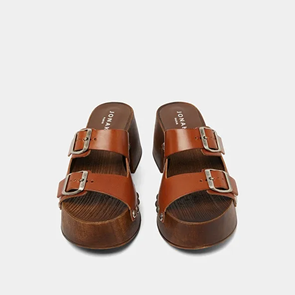 Platform mules with open toes in cognac leather