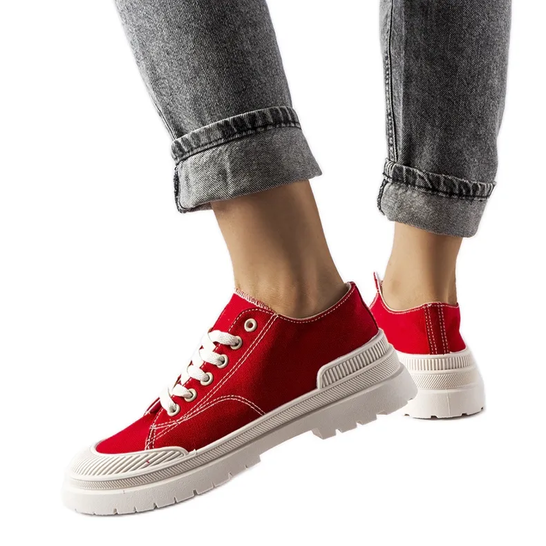 Red fabric sneakers by Nassar