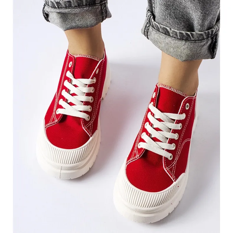 Red fabric sneakers by Nassar