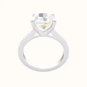 Tapered Channel Set Engagement Ring With Four Prong Head